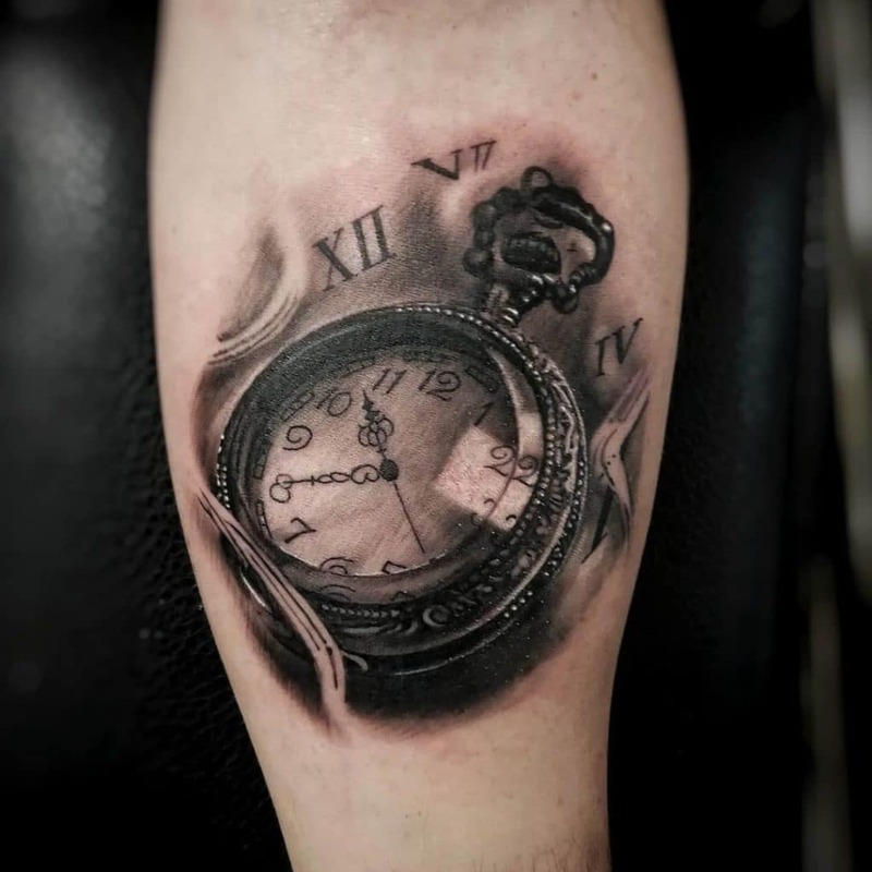 Realistic pocket watch tattoo