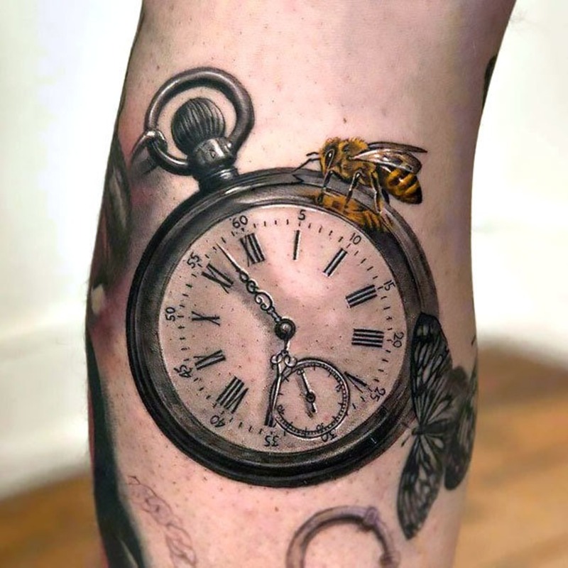 Realistic pocket watch tattoo