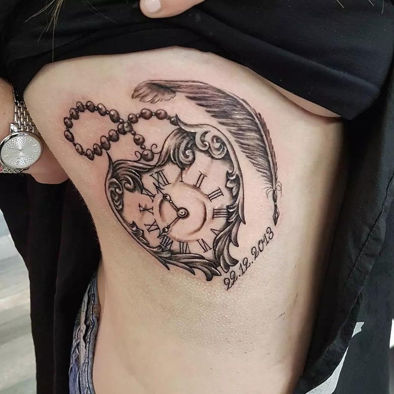 Women’s pocket watch tattoo